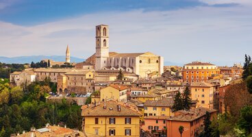 Colourful buildings on sunny day - Basilica of San Domenico in Perugia, Umbria, Italy