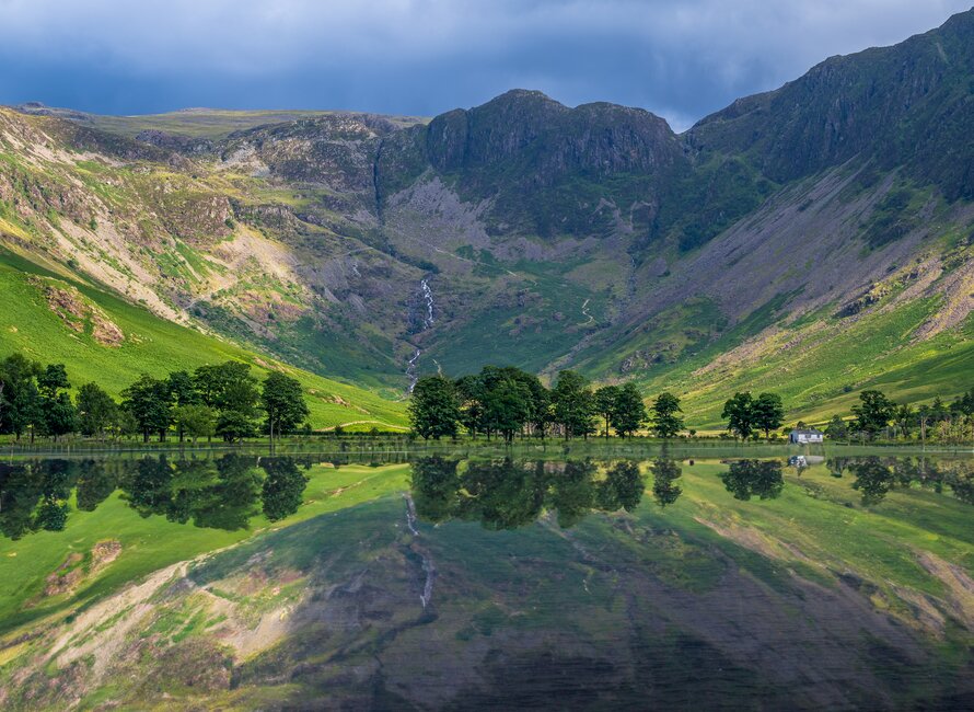 Panoramic Landscape shot of Buttermere lake and Lake District Peaks with reflection