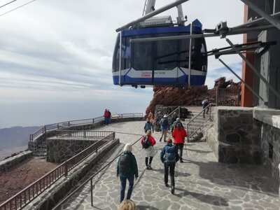 Teide National Park cable car at high point with people walking beneath, Tenerife, Spain