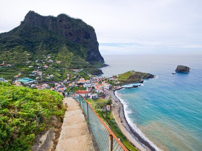 Steps leading down to Porto da Cruz close to coast with turquoise sea nearby, Madeira island, Portugal