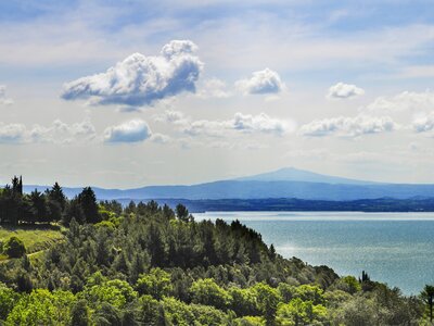 Italian landscape from Umbria with Trasimeno lake and clouds, Italy