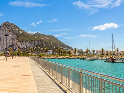 Road to Rock of Gibraltar with marina on left, La Linea, Spain