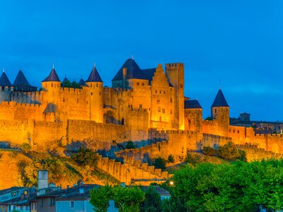 Night view over illuminated fortification of Carcassonne, France