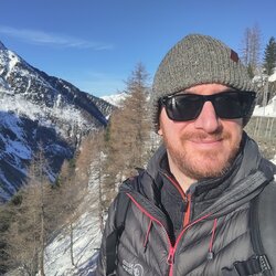 Ramble Worldwide Product Manager Martin Hunt in snowy landscape on sunny day