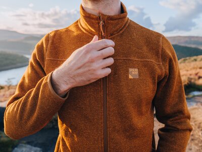 Man in outdoor clothing in the countryside