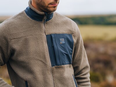 Man in outdoor clothing in the countryside